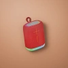 The portable, waterproof and 360-degree surround sound Bluetooth speaker with a red fabric shell Application Scenario